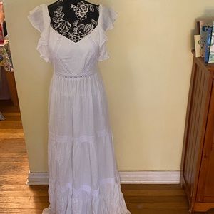 White, long, flowy dress with some lace details